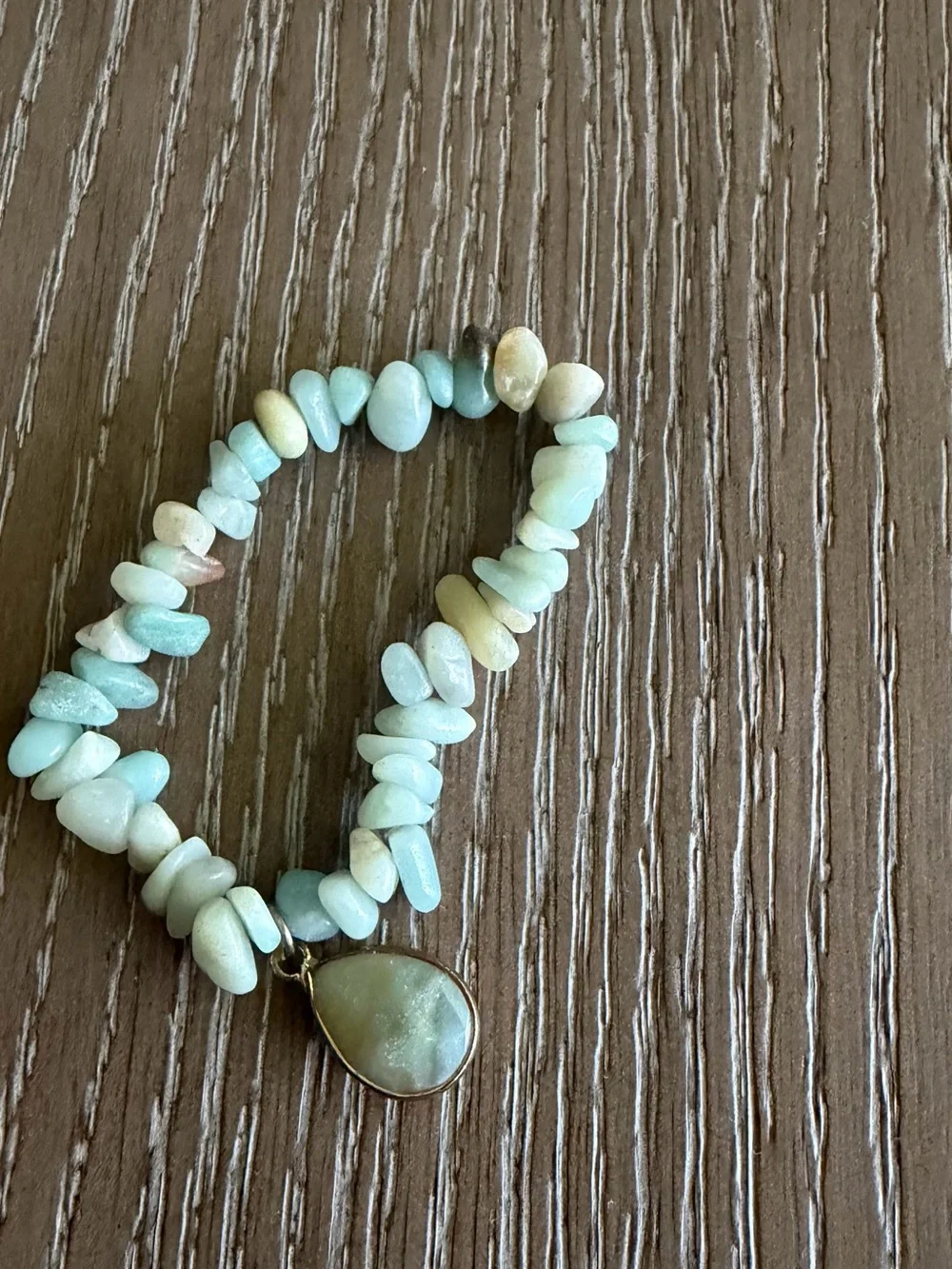 Handcrafted Mint Beaded Bracelet Stack with Crystal and Medallion LV bag.